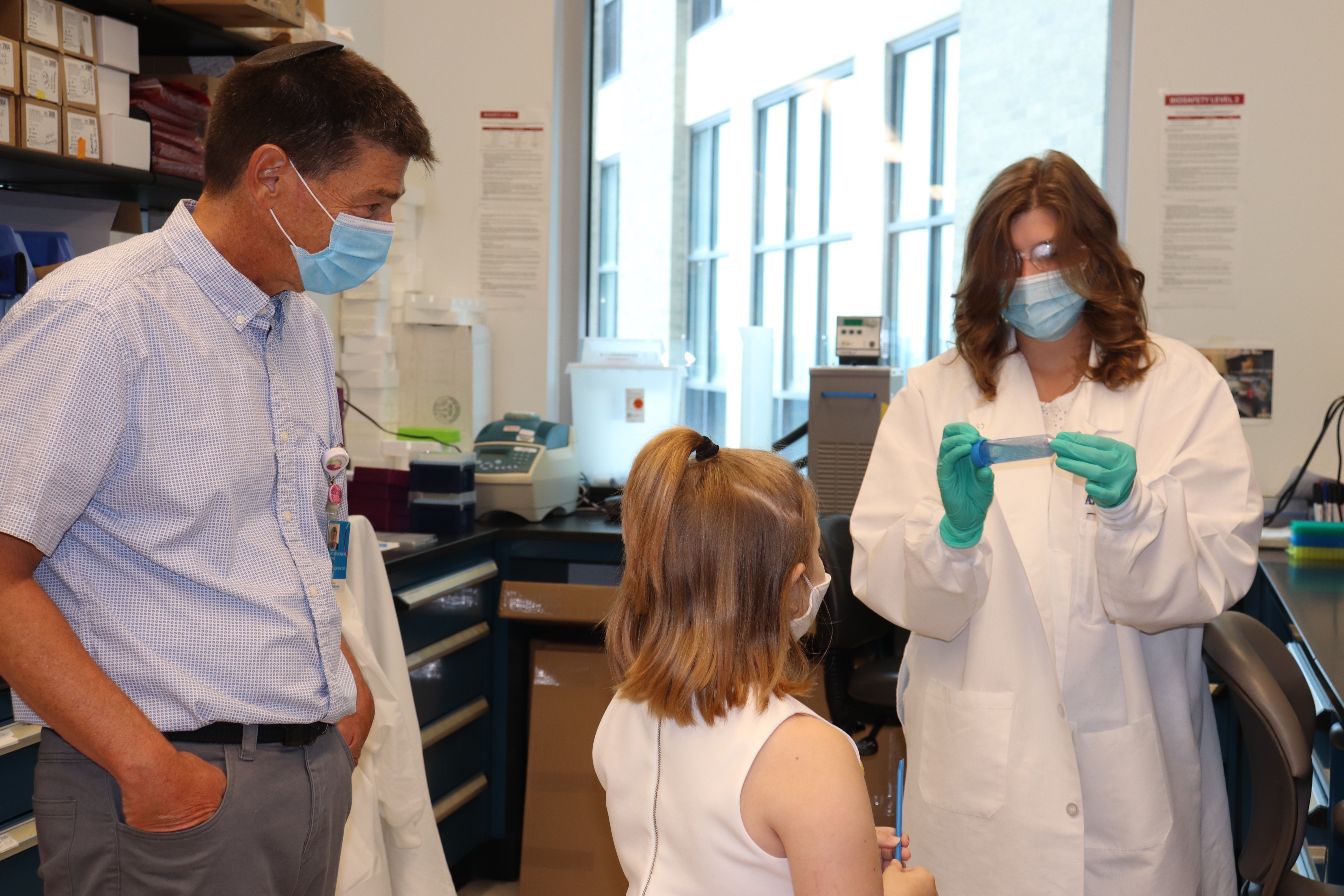 Dr. Marc Rothenberg, MD, PhD, accompanies a CEGIR patient on a tour of the research laboratory located at Cincinnati Children's Hospital