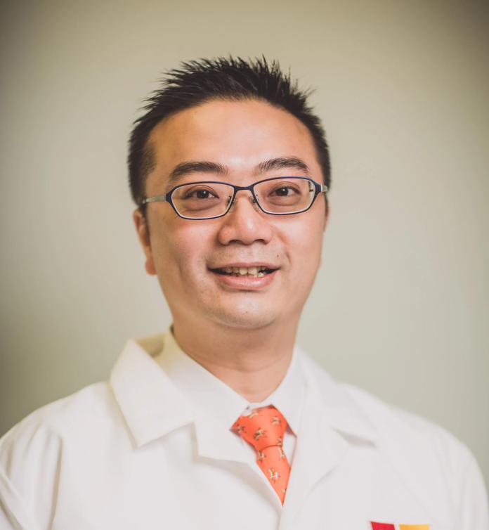 A photo of John Leung, MD.